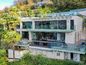 Moderna Villa di Lusso con Vista Lago e Piscina a Sfioro a Montagnola